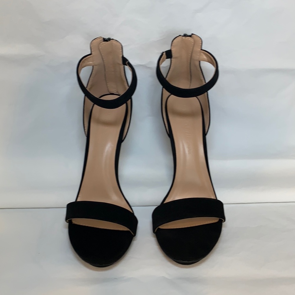 Windsor brand black stiletto with zipper.  Never worn with box.